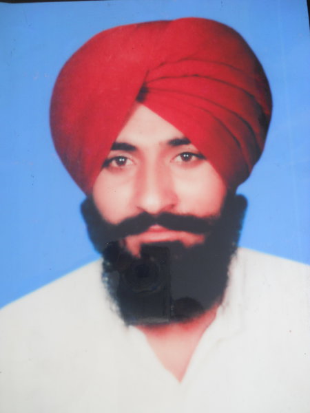 Photo of Jagtar Singh, victim of extrajudicial execution on October 27, 1989, in Amritsar,  by Punjab Police; Black cat, in Amritsar, by Punjab Police