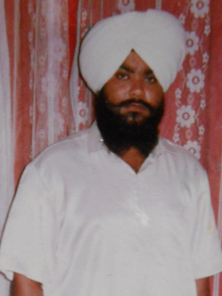 Photo of Onkar Singh,  disappeared on October 10, 1992, in Firozpur, Faridkot,  by Punjab Police; Black cat