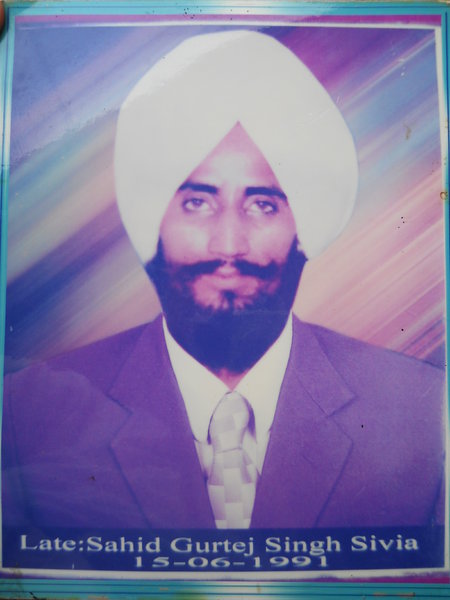 Photo of Gurtej Singh, victim of extrajudicial execution on June 15, 1991, in Bathinda, by Punjab Police; Black cat